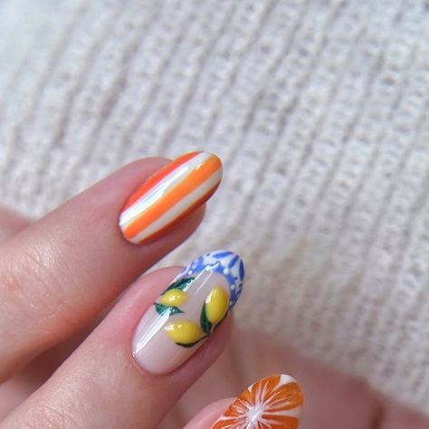 Amber Hancock on Instagram: "Amalfi coast nails🍋🇮🇹⛱️ I saw @palomanailstudio custom press on’s, and I just had to create my own version! Also managed to intertwine a @learnahstarbuck_nailartist inspired 3D Orange which I’ve been desperate to try🍊  Products used @the_gelbottle_inc  Double Denim, Signature, Michelle, Daisy, Precious, Love letter, Tiger, Ignite, Atelier, Flashing lights, Queen bee, Jungle, Crush, Doe & Clear 3D studio gel   #amalfinails #amalficoastnails #3dnails #fruitnails #detailednails #summernails #nailinspo" Amalfi Nails, Amalfi Coast Nails, Coast Nails, Bee Nails, Abstract Nails, Flashing Lights, 3d Studio, Double Denim, Queen Bee