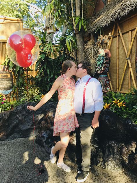 We finally did our Carl & Ellie costumes after talking about it forever! We were bummed that the balloon wall in DCA is no longer there, but aside from the “Adventure is out there” sign exiting Pixar Pier, the Tiki Room area is a fun Paradise Falls-esque place for a photo 🎈 #Up #Disneybound #Pixar #CarlandEllie #DisneyStyle Up Disneybound, Pixar Disneybound, Pixar Pier, Carl And Ellie, Paradise Falls, Adventure Is Out There, Cars Land, Tiki Room, Balloon Wall