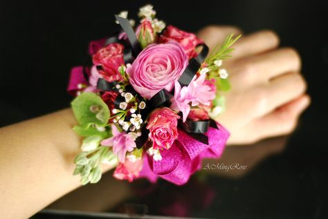 Ranunculus, Spray Roses, Hyacinth, Bells of Ireland and waxflowers. Hot Pink Wrist Corsage, Prom Corsage Pink, Pink Wrist Corsage, Succulent Corsage, Prom Flowers Corsage, Black Corsage, Homecoming Flowers, Bells Of Ireland, Wrist Corsage Prom