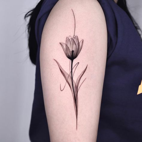 31 Refreshing Tulip Tattoo Ideas To Inspire You in 2024 Tulip Tattoo Ideas, Stippling Tattoo, Black And White Flower Tattoo, Filigree Tattoo, Tulip Tattoo, Flower Tattoo Back, Bunny Tattoos, Flame Tattoos, Floral Tattoo Design