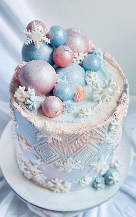 Blue And Pink Cake Birthday, Birthday Cake Winter Theme, Winter Cakes Birthday, Pastel Pink And Blue Cake, Pink Winter Wonderland Cake, Pink And Blue Winter Wonderland Party, Pink Snowflake Cake, Winter Cake Ideas, Pink And White Snowflake Cake