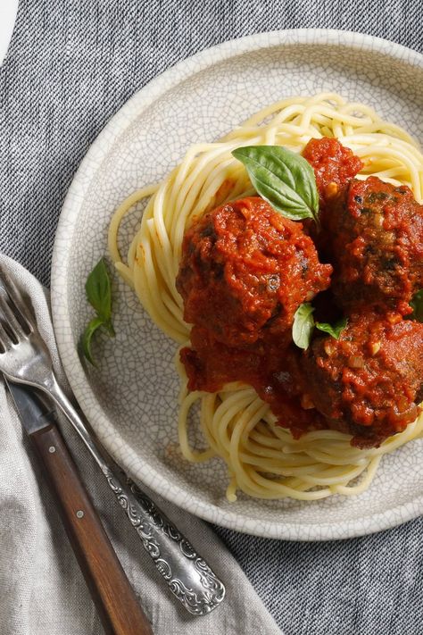 NYT Cooking: Made with equal parts ground beef (for flavor) and pork (for fat), these meatballs use a time-saving technique involving softening bread crumbs in an egg-ricotta mixture. This keeps them impossibly light and fluffy while forgoing the usual step of soaking bread in milk, which many meatball recipes require. Aside from leaving you one pot fewer to clean, making your tomato sauce in the same dish ... Cooking Meatballs, Meatballs Sauce, Meatballs And Sauce, Alison Roman, Nyt Cooking, Meatball Recipes, Time Saving, Sauce Recipe, One Pot Meals