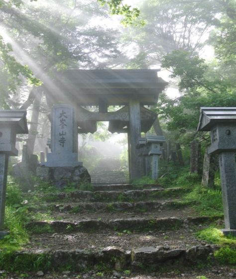 ŌMINESAN-JI, Japan: is an important temple of the Shugendō religion, which syncretizes Buddhist belief with ancient mysticism, the aim being union with kami nature spirits. The temple is located at the top of Mount Ōmine, famous for its three tests of courage involving climbing or hanging from projecting rocks. According to legend, Ominesan-ji was founded by the ascetic progenitor of the Shugendo religion, En no Ozunu, in the late 7th century. Women are not allowed in the temple. Chinese Temple Aesthetic, Ancient Japan Aesthetic, Samurai Temple, Moodboard Wall, Temple Aesthetic, Fantasy Country, Chinese Temples, Rock Temple, Buddhist Beliefs