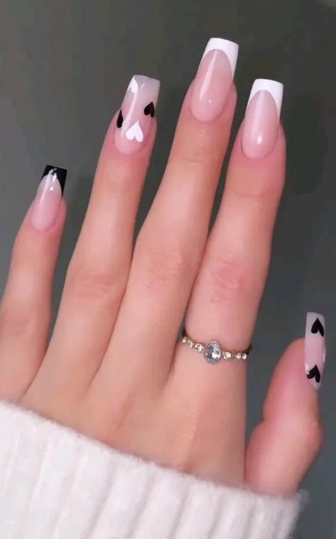 Check out these 30 chic black and white nail designs that make a statement! From french tips to geometric patterns, there's something for you. Whether you prefer gel, acrylic, or natural nails in short square, almond, or coffin shapes - we've got ideas for you. Discover the timeless beauty of black and white nails with simple yet cute designs that are sure to elevate your aesthetic. Find your perfect black and white nail inspo here! Plus: that girl nails, glow up nails Nail Ideas Black With Design, Square Nail Designs French Tip, Black And White Simple Nails, French Tip Acrylic Nails Designs, Black White Pink Nails, White Nails With Black Designs, Black And White Valentine Nails, Nail Designs Pink And Black, Short Black And White Nails