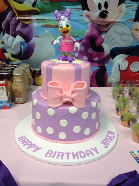 Daisy Duck cake in pink and purple.  Cake by TracyCakesAR. Duck Birthday Cake, Pink And Purple Cake, Daisy Duck Cake, Daisy Duck Birthday, Daisy Duck Party, Duck Cake, Purple Cake, Minnie Mouse 1st Birthday, Daisy Cakes