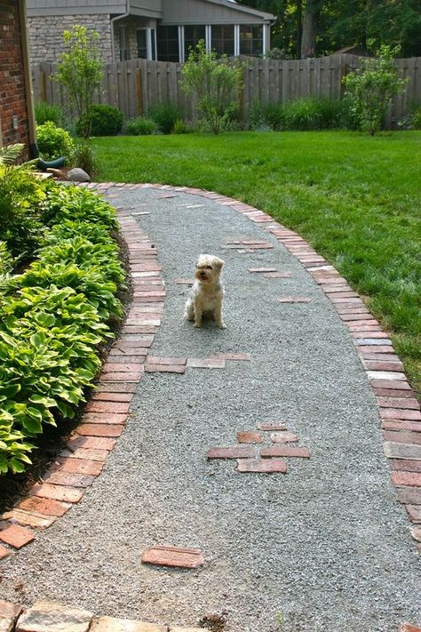 a gravel pathway lined with red bricks is a stylish and timeless idea, and your gravel won't finish on the lawn Shed Inspiration, Gravel Pathway, Pea Gravel Patio, Brick Edging, Walkways Paths, Gravel Patio, Gravel Path, Gravel Garden, Pea Gravel