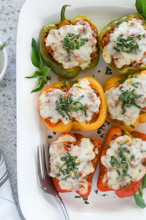 Italian Stuffed Peppers are tender bell peppers filled with ground beef, rice and marinara sauce, and they're topped with mozzarella cheese and fresh basil. They're a hearty, delicious dinner that can be made entirely in advance! #stuffedpeppers #glutenfree #mealprepdinner Italian Stuffed Bell Peppers, Italian Stuffed Peppers, Ground Beef Rice, Stuffed Peppers Recipe, Beef Rice, Dinner Meal Prep, Homemade Marinara, Gluten Free Dinner, Peppers Recipes