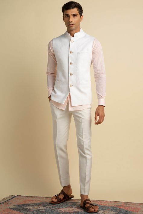 Featuring a white bundi jacket in linen base. This contains only one piece.  FIT: True to size. COMPOSITION: Linen. CARE: Dry clean only. Usher Outfits, Sleevless Jacket, Indian Wedding Clothes For Men, Nehru Jacket For Men, Boots Outfit Men, Indian Groom Wear, Blazer Outfits Men, Kurta Men, Wedding Outfit Men