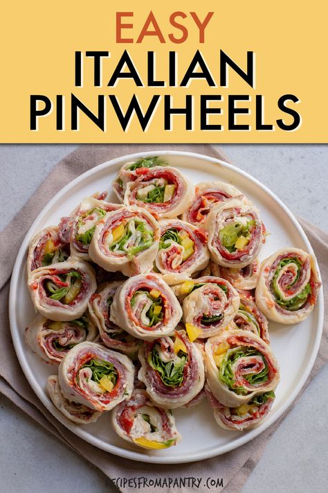 Irresistible Italian pinwheels feature a medley of savory ingredients like Genoa salami and pepperoni, cream and provolone cheeses, yellow bell and roasted red peppers, all rolled up in a soft tortilla. Pinwheels are a fun finger food that both kids and adults love! Whether you're entertaining a crowd or simply craving a savory treat, this Italian pinwheel recipe is a an easy and convenient dish that is sure to be a hit! Click through to get this awesome Italian Pinwheels recipe!! #pinwheels Italian Pinwheel, Italian Pinwheels, Meal Starters, Pinwheel Recipe, Poolside Snacks, Dash Recipe, Tortilla Pinwheels, Pinwheel Sandwiches, Pinwheel Appetizers