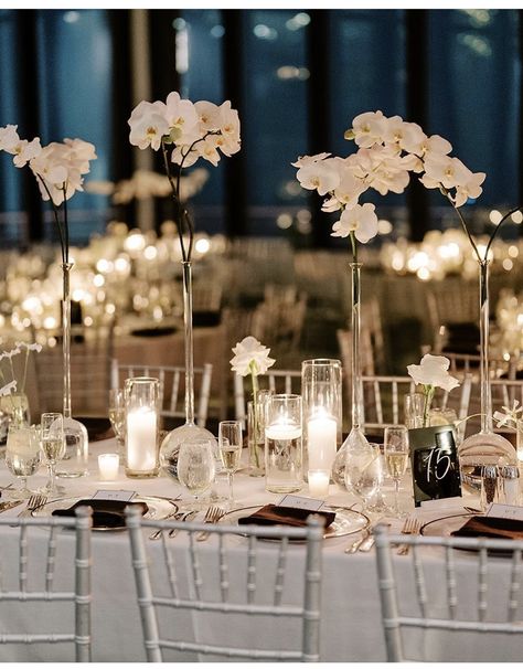 Orchid Centerpieces Wedding, Table With Candles, Wedding Reception Candles, Dining Table Candles, Bud Vases Wedding, Minimalist Wedding Reception, Table Candles, Stem Flowers, Black And White Wedding Theme