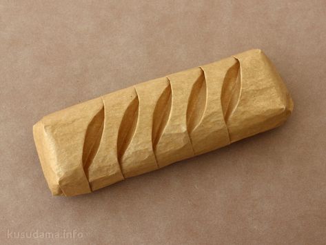 This is a great looking loaf of origami bread. I bet you could user much longer paper to make a really long baguette style loaf too. #origami Origami Food, Baguette Bread, Pop Up Art, Loaf Of Bread, Food Out, Kids Learning Activities, Baking Paper, Food Crafts, Paper Crafts For Kids