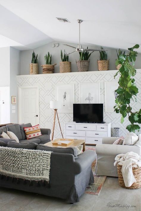 Snake Plant Basket Ledge, Plants On High Ledge, Grey Living Room With Plants, Plants On A Ledge, Decor For Ledge In Living Room, Vaulted Ceiling Shelf Decor Living Room, Vaulted Ceiling Ledge Decor Living Room, Decorating Ledges In Living Room, High Ledge Decor