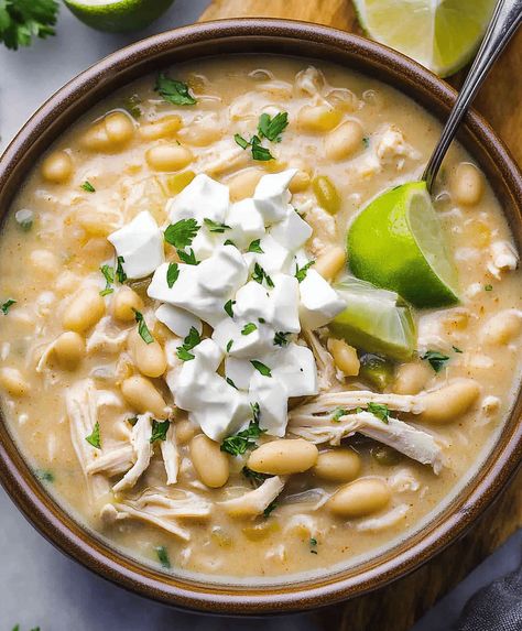 Creamy Crockpot White Chicken Chili Recipe Chicken Chili Crockpot Recipes, White Chicken Chili Crockpot Recipes, Chili Crockpot Recipes, Chicken And White Bean Soup, White Bean Chicken Chili Crockpot, White Chicken Chili Crockpot, Chili Crockpot, White Chicken Chili Recipe, Chicken Chili Crockpot