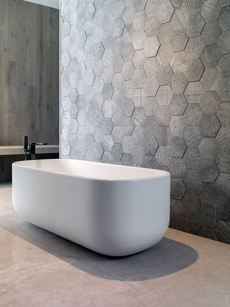 13 Cool Ways to Use Textured Tile | Hunker Hex Tiles Bathroom, Gray Hexagon Tile, Small Bathroom Tile Ideas, Small Bathroom Tiles, Grey Bathroom Tiles, Modern Small Bathrooms, Modern Bathroom Tile, Bad Inspiration, Bathroom Tile Designs