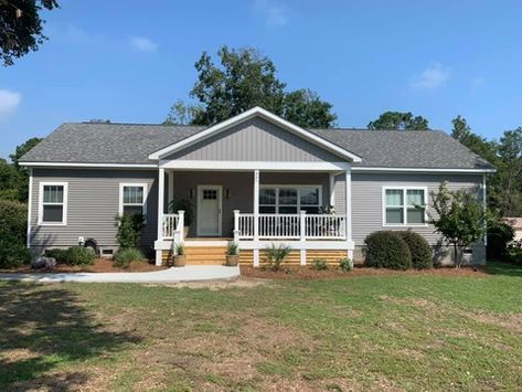 The Laramie manufactured home floor plan or modular floor plans Gable Front Porch Ranch, Adding A Front Porch To A Modular Home, Simple Foundation Landscaping, Modular Home Landscaping Ideas, Porch On A Mobile Home, Double Wide Landscaping Ideas, Modular Home Porch Ideas, Double Wide Porch Ideas, Double Wide Front Porch Ideas