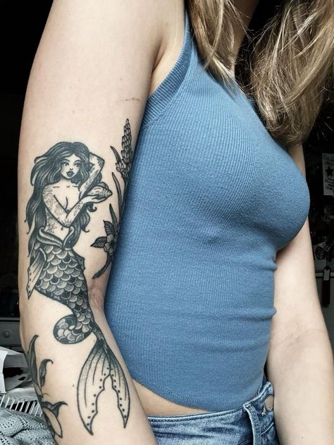 Sleeve Tattoos Mermaid, Mermaid Holding Skull Tattoo, Traditional Style Mermaid Tattoo, Mermaid Arm Tattoos For Women, Moon Mermaid Tattoo, Trad Mermaid Tattoo, Mermaid Foot Tattoo, Mermaid Sleeve Tattoo, Old School Mermaid Tattoo