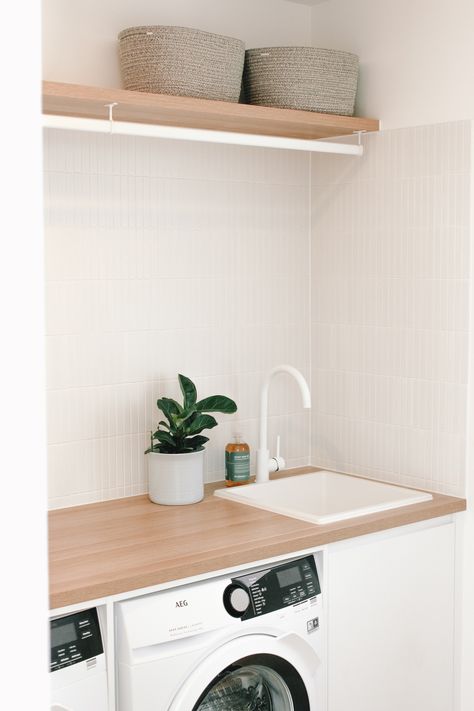 Laundry Room Ideas Australia, Laundry Australia, Tile Splashback Laundry, Laundry Timber Benchtop, Abi Interiors Laundry, Laminex Laundry Benchtop, Modern Australian Laundry, White Tapware, Laundry Tapware