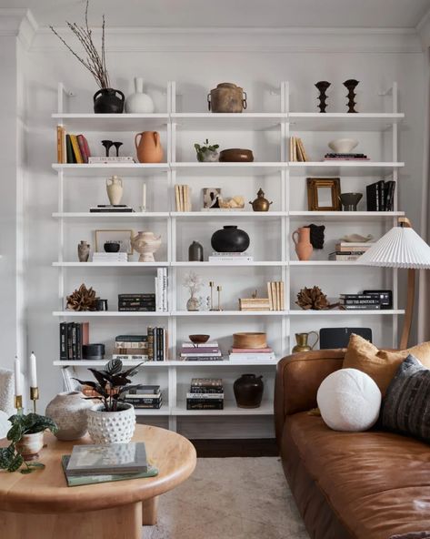 The Couple Behind Jewelry Brand Mejuri Evoke Their Signature Everyday-Cool Style at Home Shelfie Decor, Classic Fireplace, Room Bookshelf, Dark Green Wallpaper, Book Corner, Domino Magazine, Victorian Townhouse, Neutral Furniture, House Vibes