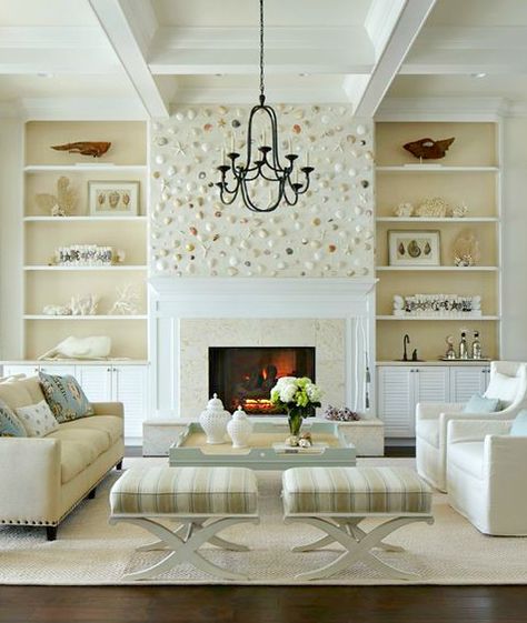 Shell Wall above Fireplace in an Elegant White Coastal Living Room: http://www.completely-coastal.com/2015/07/shell-wall-above-fireplace.html Moroccan Fireplace, Net Room, Room Pinterest, Grey Hardwood, Beach Theme Living Room, Deco Interiors, Florida Beach House, Cream Living Rooms, Popular Living Room