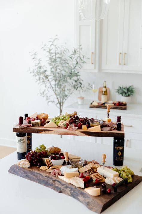 This beautiful, PERSONALIZABLE, handcrafted, live-edge charcuterie board is made out of Black Walnut wood and provides a stunning rustic display option for an assortment of meats and cheeses! Handmade in my home workshop. A wonderful gift for housewarmings, weddings, anniversaries, and even corporate gifts! UNIQUENESS Each black walnut board is specially handpicked and is totally unique with its own characteristics and individuality. Therefore, each board is a little bit different, but all will Charcuterie Store Display, Wedding Cheese Board, Barn Bar, Live Edge Charcuterie Board, Grazing Boxes, Thanksgiving 2024, Walnut Board, Candy Poster, Animal Based