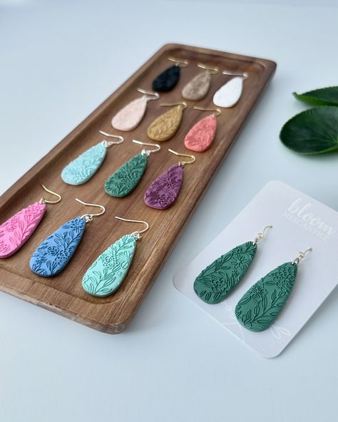 Floral textured teardrop dangle polymer clay earrings 😍. This cutter shape has been around since my very first launch as a cutter maker and has been a long running best seller. This cutter is paired with our Floral Doodle Finelines texture mat for a perfect combination 🤩 These earrings are available now! www.BloomMercantile.com #polymerclay #polymerclayearrings #clayearrings #claycutters #polymerclaycutters #handmadeearrings #earringshandmade #jewelrydesigner #handmadejewelry Textured Clay Earrings, Clay Dangle Earrings, Floral Doodle, Polymer Clay Jewelry Tutorials, Polymer Earrings, Nickel Free Earrings, Clay Jewelry Diy, Earring Posts, Diy Clay