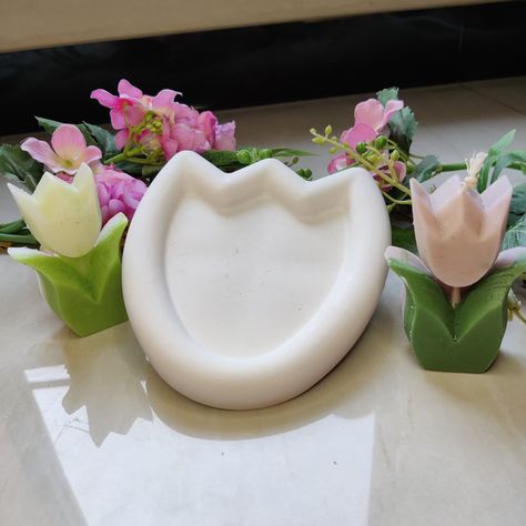 🌷 Tulip trinket dish & Tulip Flower Candle 🌷 Dm to order COLOR WILL BE CUSTOMIZED. #tulip #gypsumdecor #Candle #trinketdishesofinstagram #artisanalhomedecor #homeowner #smallbussinessowner #tulipcandle Air Dry Clay Tulips, Tulip Coaster, Ceramic Tulip, Tulip Night Lamp, Tulip Candle, Tulip Flower, Flower Candle, Tulips Flowers, Trinket Dish