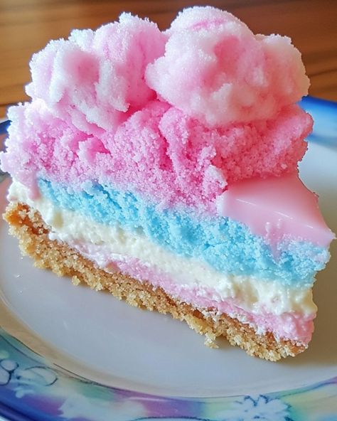 🎡 Cotton Candy Cheesecake 🎡 Ingredients: - 1 1/2 cups graham cracker crumbs - 1/4 cup granulated sugar - 1/2 cup unsalted butter, melted - 16 oz cream cheese, softened - 1 cup powdered sugar - 1 teaspoon vanilla extract - 1 cup heavy cream - 1 cup cotton candy, plus extra for topping - Food coloring (optional) Instructions: 1. Preheat the oven to 325°F (163°C). Grease a 9-inch springform pan. 2. In a bowl, mix graham cracker crumbs, sugar, and melted butter until combined. Press the mixtur... Cotton Candy Cheesecake, Candy Cheesecake, Cotton Candy Recipe, Cotton Candy Cake, Cheesecake Ingredients, Cotton Candy Cakes, Springform Pan, Dessert Lover, Healthy Delicious