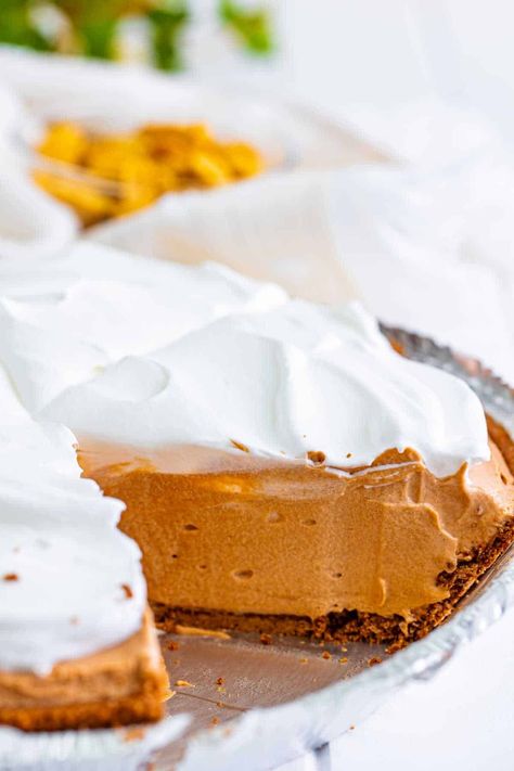 You know what's a game-changer for dessert lovers? This no-bake Chocolate Peanut Butter Pie that's silky smooth, made with instant pudding, and has that creamy, rich sweetness everyone craves. It's quickly become my go-to favorite when I want something both easy and decadently sweet. Instant Pudding Pie, Easy Chocolate Pie, Peanut Butter Pie Recipe, Butter Pie Recipe, Peanut Butter Dessert Recipes, Yummy Pie Recipes, Chocolate Peanut Butter Desserts, Pudding Pie, Chocolate Peanut Butter Pie