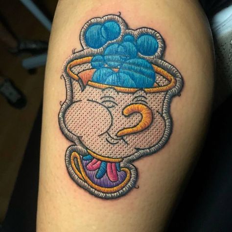 Chip from Beauty and the Beast. Embroidery Tattoo Designs. Click the image, for more art by Duda Lozano. Brazilian Tattoo, Chip Tattoo, The Beast Tattoo, Beast Tattoo, Tattoo Zone, Beauty And The Beast Tattoo, 90s Tattoos, Embroidery Tattoo, Stitch Tattoo