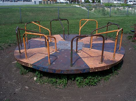 Talk about way back when.  Every park had one and it was a chanllenge to run and jump on, stay on especially when it was crowded. Old Playground, Vintage Playground, School Playground Equipment, Poker Party, Fun Pictures, School Playground, Park Playground, Playground Design, Merry Go Round