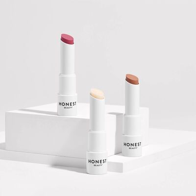 Lip Balm Photography Ideas, Lip Balm Product Photography, Lip Balm Photography, Lip Balm Packaging, Website Background, Mini Lipstick, The Honest Company, Sheer Shades, Kawaii Makeup