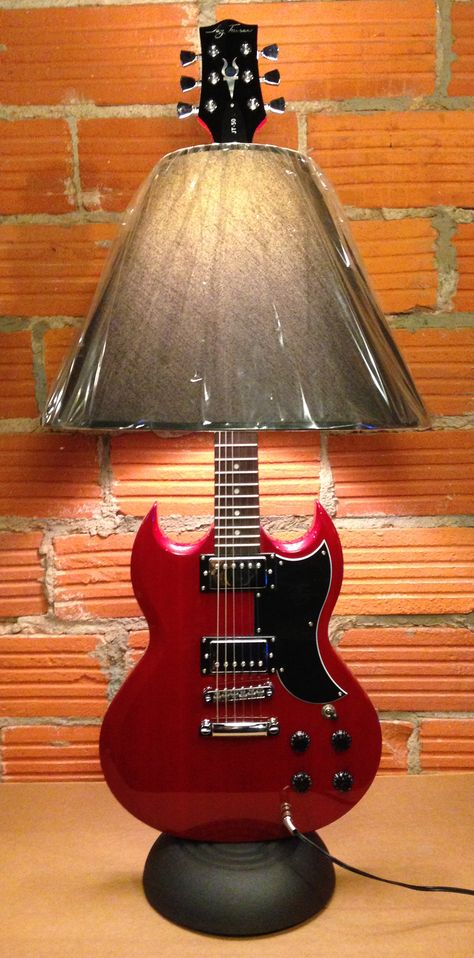 Dan Leap Designed Rock Star Guitar Lamp Guitar Diy Decor, Guitar Room Man Cave, Women Woodworkers, Old Guitar Ideas, Guitar Deco, Guitar Lamp Diy, Rock Star Guitar, Guitar Craft, Man Cave Inspiration