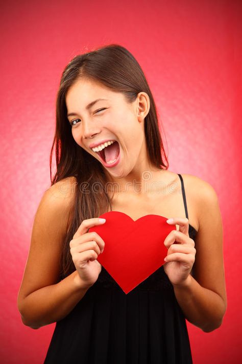 Valentines day woman. Woman holding Valentines Day heart sign. Beautiful mixed r , #Ad, #holding, #Day, #heart, #Woman, #Valentines #ad Holding Heart Pose, Holding Heart Reference, Woman Stock Photo, Face References, Holding Heart, Holding A Heart, Valentines Day Heart, Pose References, Heart Images