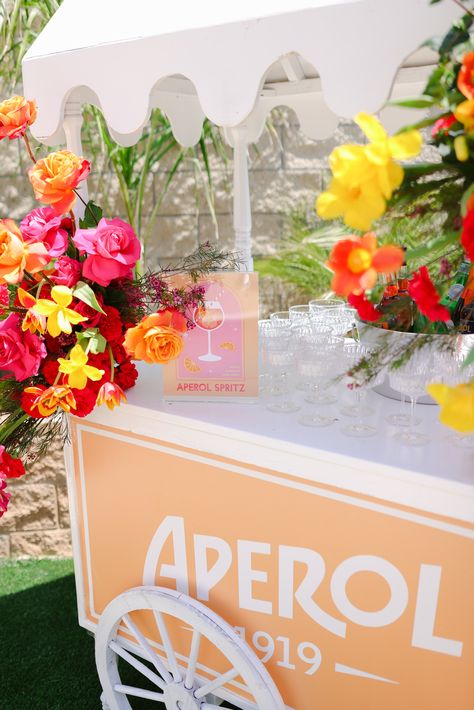 Aperol Spritz Seating Chart, European Summer Theme Party, Tutti Frutti Bridal Shower Theme, Aperol Spritz Station Wedding, Aperol Spritz Party Theme Birthday, Spritz Birthday Party, Aperol Spritz Cart, Spritz Party Theme, Aperol Spritz Station