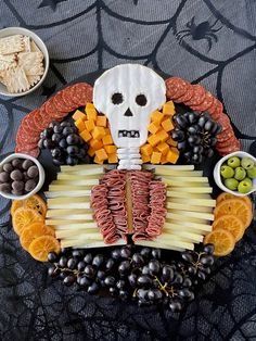 beetlejuice charcuterie board - Google Search Charcuterie Skeleton, Skeleton Charcuterie Board, Skeleton Charcuterie, Halloween Charcuterie Boards, Halloween Spread, Halloween Snack Ideas, Snack Boards, Halloween Appetizers Easy, Halloween Party Appetizers