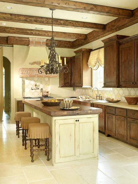 Tuscan-Influenced Kitchen--love the wood beams and butcher block top on the island. Style Toscan, Tuscan Decorating Kitchen, Tuscan Style Homes, Traditional Kitchen Design, Tuscan Kitchen, Tuscan Style, Wooden Cabinets, Wood Beams, Style Kitchen