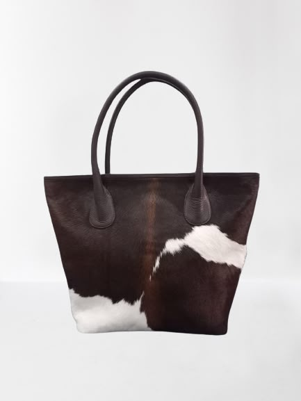 Light Weight Women's Cowhide Leather Tote Bag - Handmade - Large size tote bag - Spacious, durable and light weighted - 100% Genuine leather & real cowhide - Customization | Personalization option available Dimension : Width x Height x Depth x Top Handle 15.5" x 11.5" x 4" x 6" The Pictures in the listing is for reference only. Each cowhide is unique in its colour and texture. The bag you'll receive will be similar in colour and texture with the picture shown in the listing. Cow Print Bag, Business Baddie, Classy Cowgirl, Cowhide Purse, I Have Money, Custom Handbags, Cowhide Bag, Work Tote Bag, Style Box