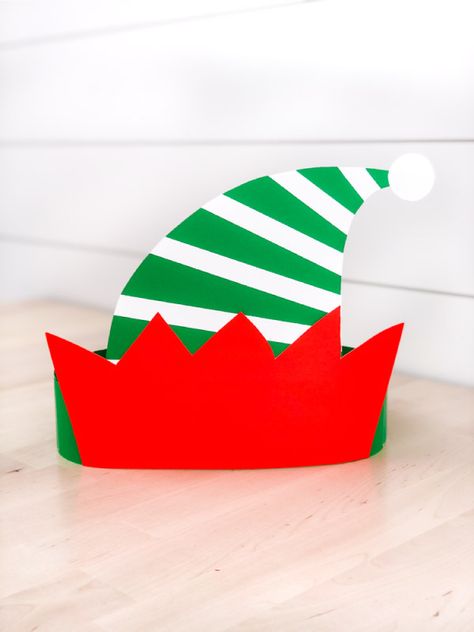 This easy elf headband is a fun Xmas craft for preschool kids! Download the free template in full color, craft version or black and white for kids to color!#simpleeverydaymom #preschool #preschoolcrafts #preschoolers #xmascrafts #christmascrafts Elf Hats Craft For Kids, Elf Hat Diy, Christmas Headband Craft, Elf Activities For Kids, Elf Hat Craft, Elf Headband, Christmas Headband Diy, Xmas Crafts Kids, Creative Hats