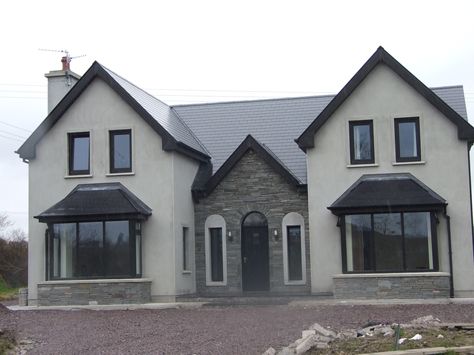 almost finished, new storey and a half residence in Kerry, Ireland Irish House Plans, House Plans Ireland, Dormer House, Ireland Houses, House Designs Ireland, Houses In Ireland, Two Storey House Plans, Houses Exterior, Irish Houses