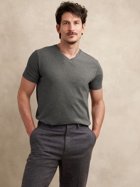 This classic v-neck t-shirt is cut from our Luxury-Touch cotton jersey—beloved for its signature softness and a smooth finish that leans more dressed-up in appearance.  V-neck.  Straight hem with vented sides.  Standard fit.  Short sleeves.  Hits at the hip.  Model: Size M, 6'2" (188cm). V Neck Tshirt, Mens Business Casual, Business Casual Men, Fashion Story, Big And Tall, Curator Style, Charcoal Gray, Daily Fashion, Charcoal Grey