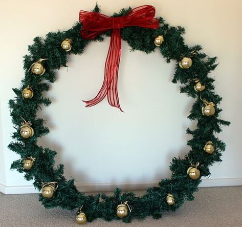 Looking for something to do with your old hula hoop? These DIY Hula Hoop Crafts are the perfect answer for anyone with the retro toys lying around. Giant Christmas Wreath, Giants Wreath, Outdoor Christmas Wreaths, Large Christmas Wreath, Diy Girlande, Christmas Hacks, Christmas Decorations Diy Outdoor, Wreaths Diy, Xmas Wreaths