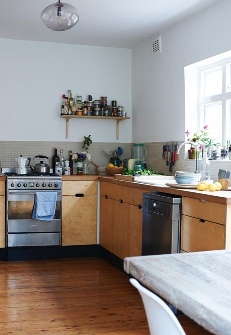 Plywood under the counter kitchen cabinets with cut out handles and wood countertop in kitchen of Anna Jones London home | Remodelista Plywood Cabinets Kitchen, Cabinet Hardware Trends, Anna Jones, Clean Kitchen Cabinets, Plywood Kitchen, Plywood Cabinets, Chefs Kitchen, Wooden Kitchen, Beautiful Kitchens