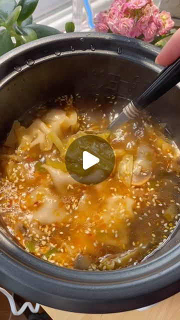 Jenna Hunter, MS RD on Instagram: "Single Serve Dumpling Noodle Soup made in the rice cooker ✨ I know my rice cooker is sick of me now but this recipe is perfectly balanced & great for a quick lunch or dinner! I have more recipes like this in my new book called Compact Cooking, available for preorder on Amazon, Target, & Barnes & Nobles! Check it out if you’re interested! (Recipe below & follow @thehealthyhophead for more easy recipes!) Recipe- Ingredients: 5 dumplings or pot stickers of choice 2 oz of noodles 1/2 cup sliced mushrooms 1 cup diced cabbage 1 tbsp chopped green onions 1 tsp sesame seeds 1 tbsp chili oil 1 tbsp chili garlic crisp 1 tbsp soy sauce 1 bouillon cube 2 cups of water Directions- 1. To a rice cooker, add all the ingredients in that order. 2. Cover & cook for 10- Rice Cooker Soup, Dumpling Noodle Soup, Dumplings For Soup, Pot Stickers, Bouillon Cube, Quick Lunch, Chili Oil, Quick Lunches, More Recipes