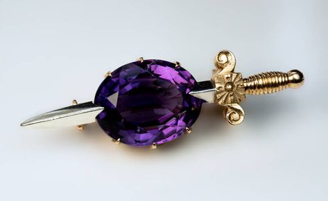 made in Moscow between 1882 and 1898 This Victorian era novelty brooch is designed as a gold sword with a silver double edged blade piercing an oval facete Antique Amethyst Jewelry, Amethyst Brooch, Gemstone Brooch, Faberge Eggs, Gold Brooch, Gold Pin, Amethyst Gold, Gold Brooches, Amethyst Jewelry