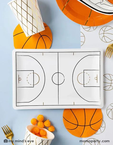 A basketball themed party table features Momo Party's basketball tableware by My Mind's Eye including basketball shaped plates, napkins, basketball court shaped large plates, basketball net gold foil party cups and paper basketball table runner - a perfect table setting inspo for kid's basketball themed birthday parties or a fun NBA viewing party! Basketball Theme Party, Basketball Birthday Parties, Paper Table Runner, Net Design, Basketball Party, Paper Cocktail Napkins, Basketball Birthday, Basketball Net, A Basketball