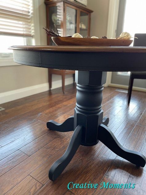 Solid Oak Round Dining Table, Refinish Old Wood Table, Black And Wood Kitchen Table Farmhouse, Table Top Stain Ideas, Round Wood Table And Black Chairs, Round Dining Table Black Legs Wood Top, Refinish Round Kitchen Table, Wood Table With Black Base, Black Stain Kitchen Table