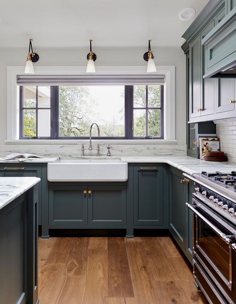 I love a delicate short marble backsplash, says interior designer Emily Henderson. "It's elegant and modern, but still protects your wall from those water stains." #marthastewart #kitchenideas #kitchens #backsplash Above The Kitchen Sink, Portland House, Shaker Kitchen Cabinets, Shaker Style Kitchens, New Kitchen Cabinets, Shaker Kitchen, Counter Tops, Traditional Kitchen, Kitchen Space