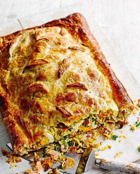 Debbie Major uses up leftover kedgeree in this gorgeous salmon and rice filled pie – perfect as a filling dinner to feed the family. Salmon Coulibiac, Savoury Pastries, Salmon Roulade, Salmon Terrine, Savoury Pie, Spiced Salmon, Salmon En Croute, Dinner Pies, Savory Tarts