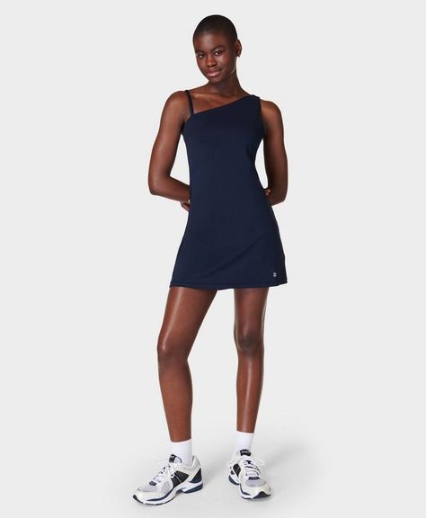 Our new asymmetric dress for street-to-studio styling. High-stretch fabric is breathable and sweat-wicking. Slim, body-skimming fit with an asymmetric neckline for a modern feel. Built-in shorts offer extra support. Front length: 77cm / 30.5". Model wears size S and is 178cm/5'10" tall. Style Code: SB9840Colour: Navy Blue Active Dress Outfit, Wimbledon 2024, Eurotrip Outfits, Womens Gym, Sporty Dress, Asymmetric Dress, Gym Clothes Women, Gym Clothing, Asymmetric Neckline