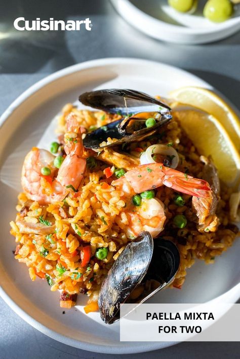 Looking for a romantic #ValentinesDay night in? Try our #Paella Mixta For Two, made simple with the help of our 6 Quart 3-in-1 #Multicooker. Once it's done cooking and you're setting the table for you and your loved one, the 'Keep Warm' function will ensure that your meal is served hot. #multicookerrecipes #slowcooker #winterrecipes #cuisinart #savorthegoodlife #dinnerrecipe #paellarecipe #valentinesdaydinner Cuisinart Recipes, Multi Cooker Recipes, Paella Recipe, Setting The Table, Valentines Day Dinner, Easy Comfort Food, Slow Cookers, Healthy Dishes, Winter Food